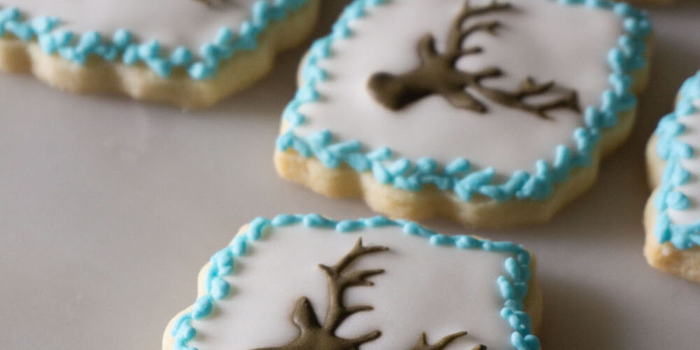 sugar cookies with royal icing transfer reindeer design